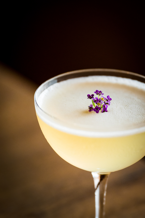 The city bee's knees is London dry gin and dry cherry mixed with citrus stock then topped with lavender and locally harvested honey. [ZEST]