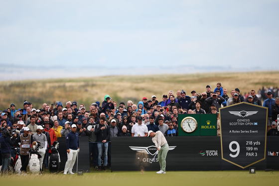 Rory McIlroy tees off on the ninth hole during the Genesis Scottish Open at The Renaissance Club on July 16, 2023 Scotland. [GETTY IMAGES]