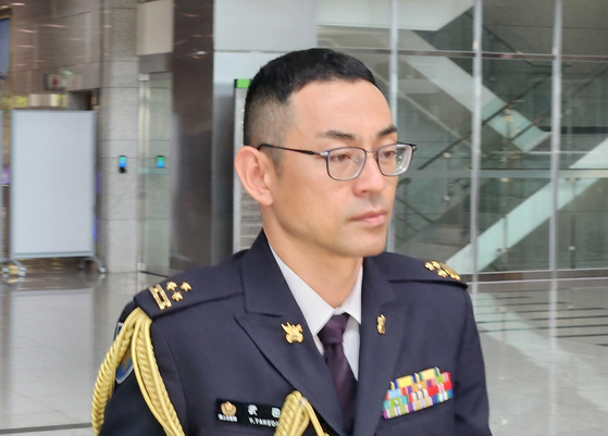 Yohei Takeda, an officer at the Japanese Self-Defense Forces stationed in Korea, walks into the Defense Ministry building in Yongsan District, central Seoul, on Friday. [YONHAP] 