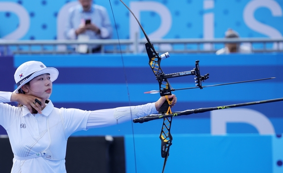 Korea's Lim Si-hyeon competes during the women's team archery gold medal match against China at the Invalides in Paris on Sunday. [EPA/YONHAP]