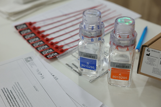 This file photo shows anti-doping testing kit materials displayed at the International Testing Agency (ITA) testing facility at the finish line of the 7th stage of the Tour de France on July 5.  [AFP/YONHAP]