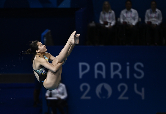 Nur Dhabitah Sabri of Malaysia competes during the women's 3-meter springboard final in Paris on Friday.  [XINHUA/YONHAP]