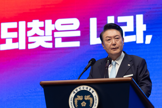 President Yoon Suk Yeol delivers a congratulatory address during a ceremony marking the 79th anniversary of the end of Japan's colonial occupation of the peninsula at the Sejong Performing Arts Center in Jongno District, central Seoul, on Thursday. [JOINT PRESS CORPS]