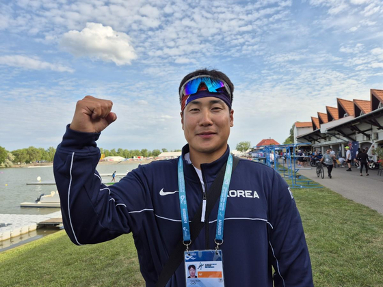 Choi Yong-beom poses for a picture after earning Korea's first ever canoe berth at the Paralympics in Hungary on May 11, 2024.  [YONHAP]