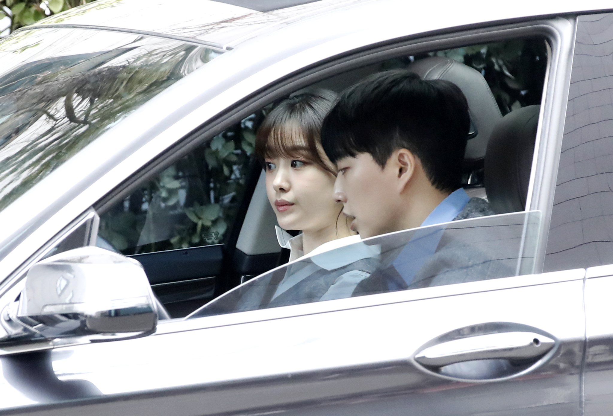 Singer Song Ji-eun, left, and YouTuber Park We of YouTube channel Weracle, seen in a car together in March [NEWS1]