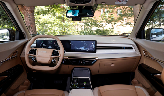 The interior of the Actyon, with the center console containing a display and all functions controlled through touch screens instead of physical buttons. [KG MOBILITY]