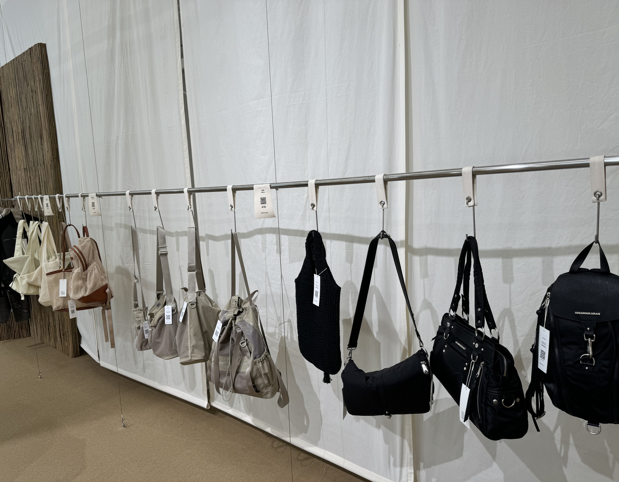 Bags are displayed in "25SS Musinsa Season Preview" venue in Seongsu-dong in Seongdong District, eastern Seoul. [KIM JI-YE]