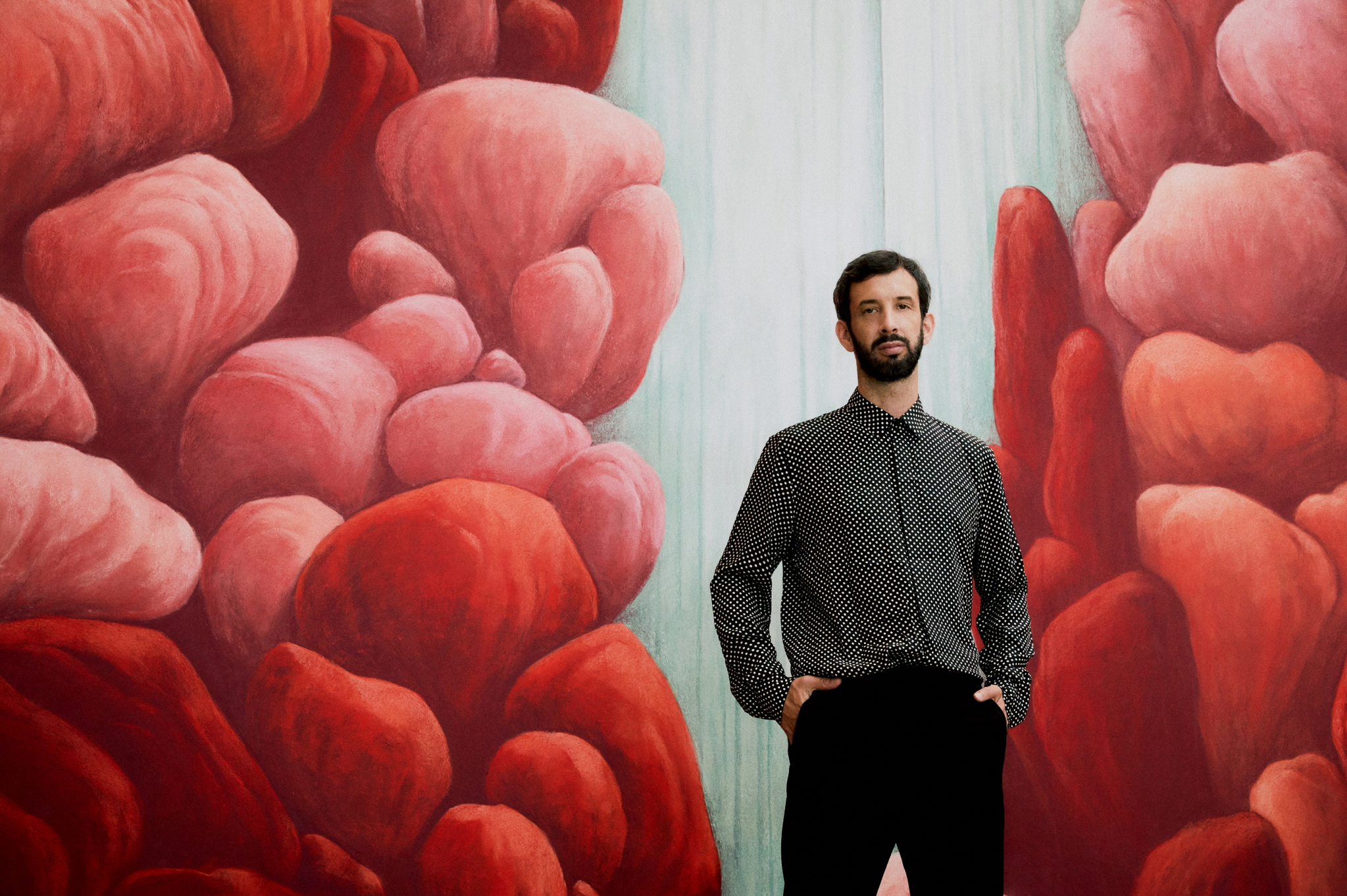 Nicolas Party in front of his latest mural piece "Waterfall" at the Hoam Museum of Art [HOAM MUSEUM OF ART]