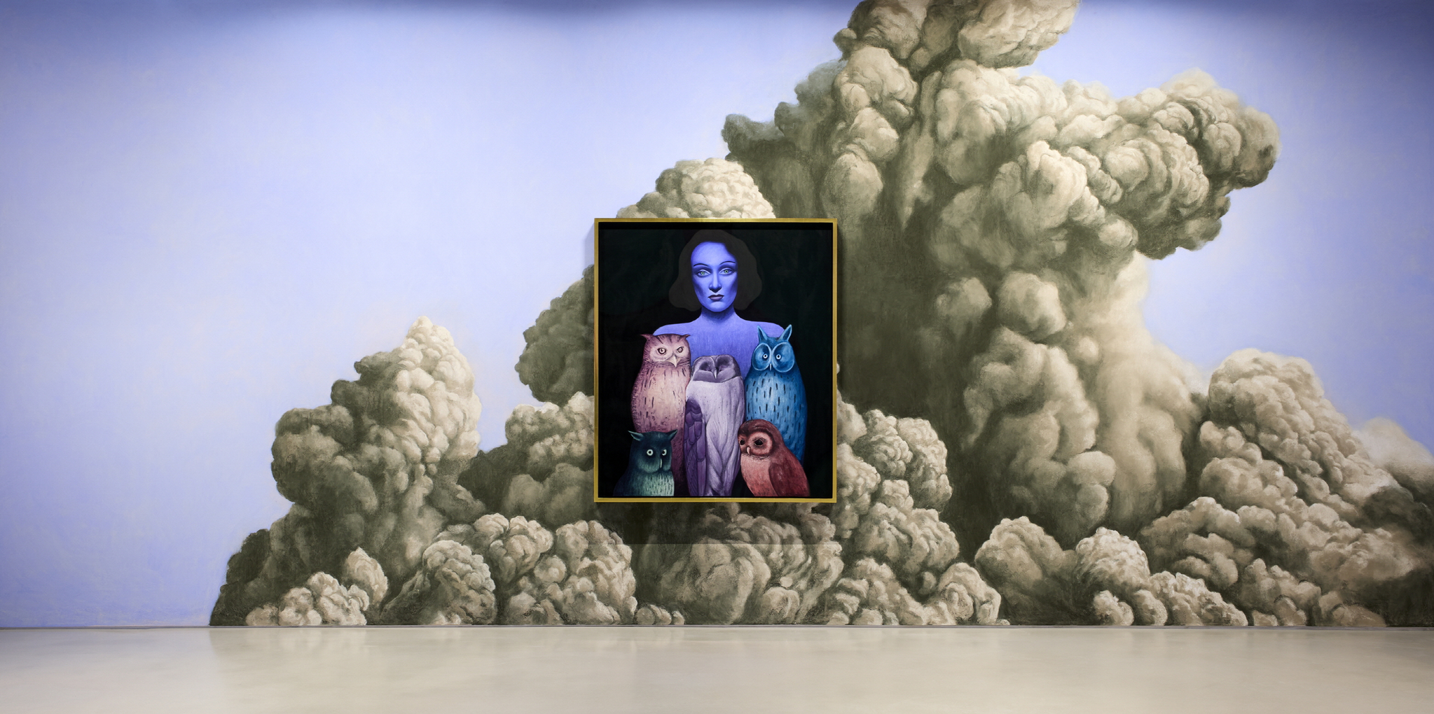 Installation view of ″Nicolas Party: Dust″ at the Hoam Museum of Art. The wall mural is titled ″Clouds,″ and the painting is ″Portrait with Owls″ (2021). [HOAM MUSEUM OF ART]