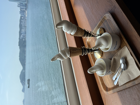 An ice cream stop at Cafe Gurme is refreshing if the intense sun has got the better of you in Huinnyeoul Culture Village, Yeongdo District, Busan. [KIM DONG-EUN]
