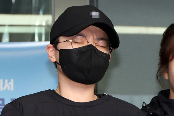 Jeon Cheong-jo heads to the prosecutors from Songpa Police Station in southern Seoul on Nov. 10, 2023. [YONHAP]