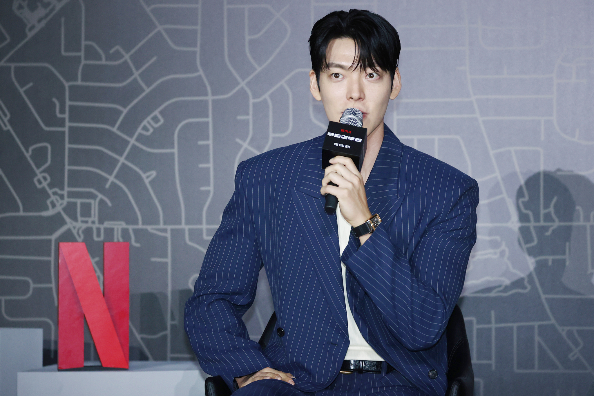 Actor Kim Woo-bin speaks during a press conference for upcoming Netflix's action film ″Officier Black Belt″ held in Gwangjin District, eastern Seoul, on Tuesday. [YONHAP]