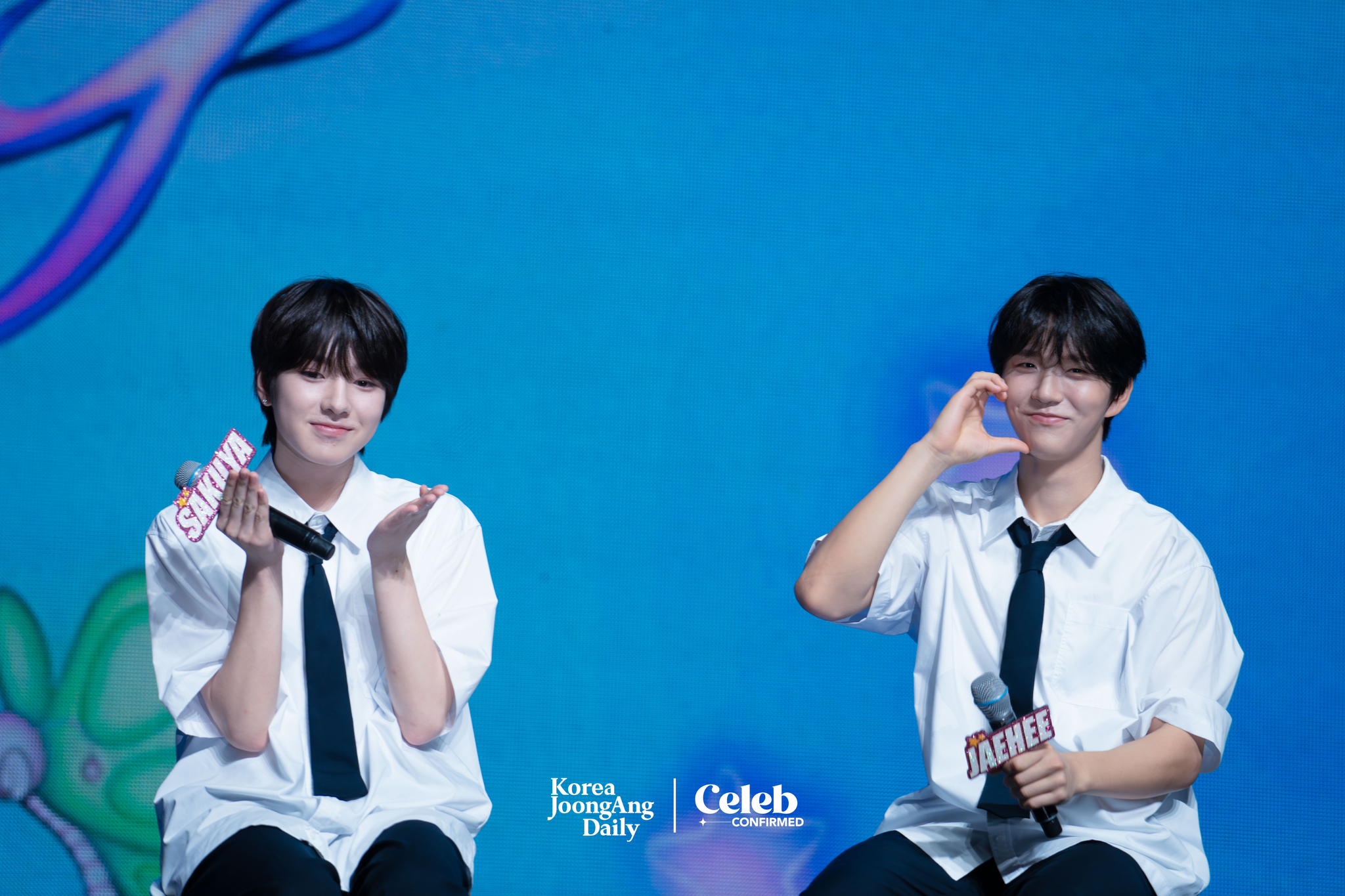 Boy band NCT Wish answers reporters’ questions during a press showcase Tuesday at the Blue Square in central Seoul. [DANIELA GONZALEZ PEREZ]