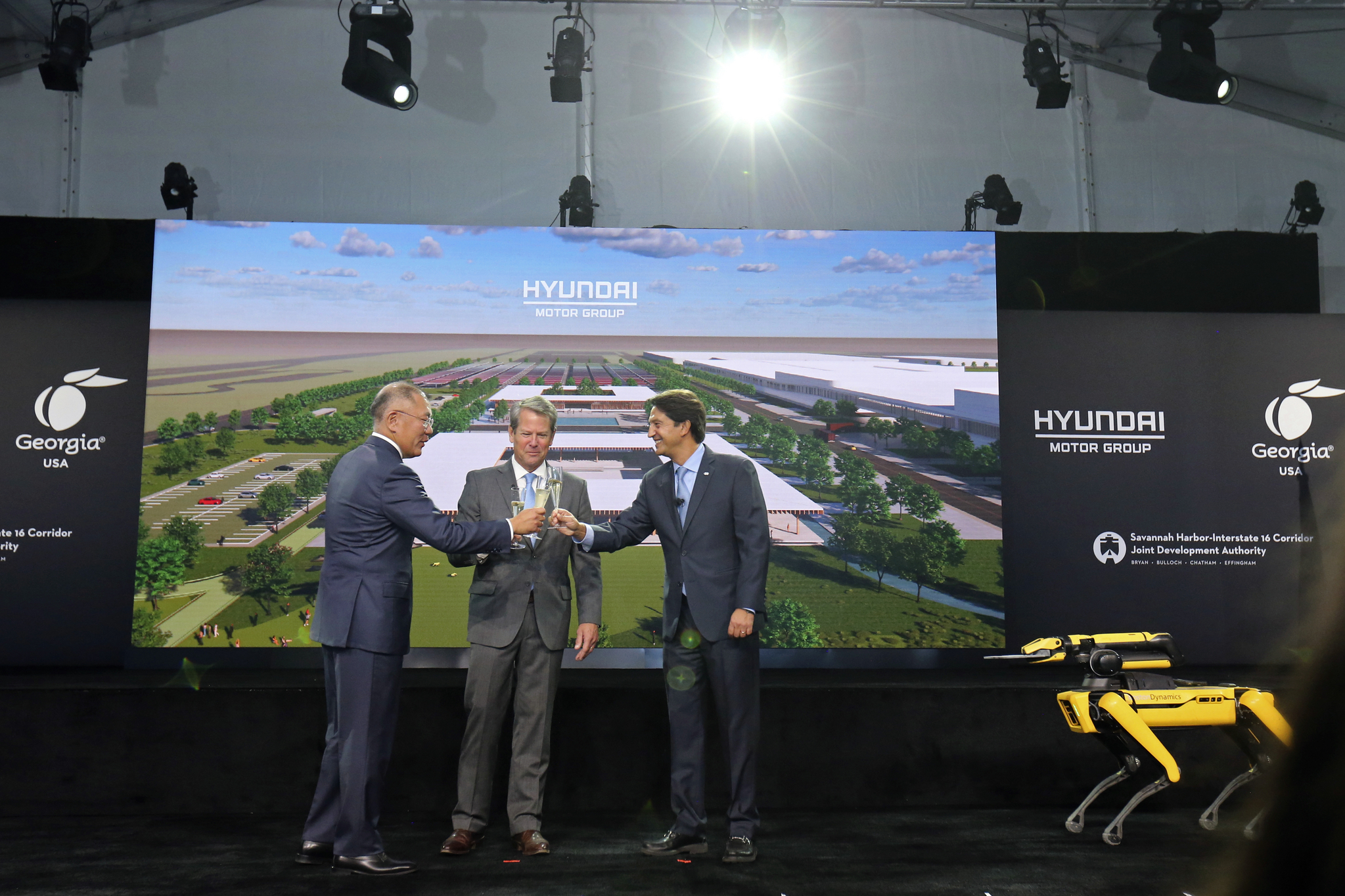 From left, Hyundai Motor Group Executive Chair Euisun Chung, Georgia Gov. Brian Kemp, and Jose Munoz, global president of Hyundai Motor, celebrate with a champagne toast during the official groundbreaking for Hyundai's EV plant in Georgia on Oct. 25, 2022. [HYUNDAI MOTOR GROUP]
