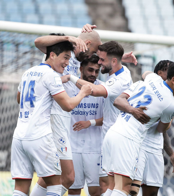 Suwon Samsung Bluewings players celebrate during a game against Bucheon FC 1995 at Bucheon Stadium in Bucheon, Gyeonggi on Oct. 19 in a photo posted to the club's official Instagram account.  [SCREEN CAPTURE]