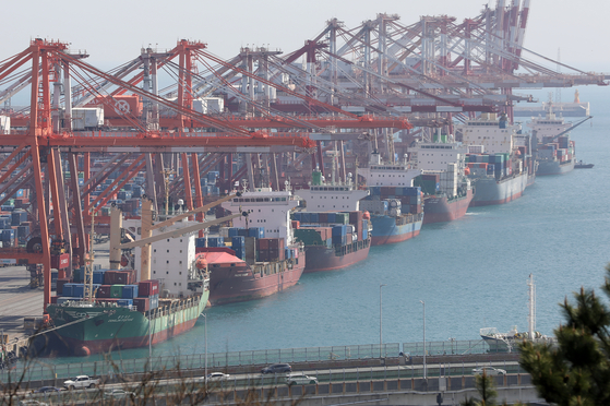 Containers for exports are stacked at a port in the southeastern city of Busan on April 1. [NEWS1