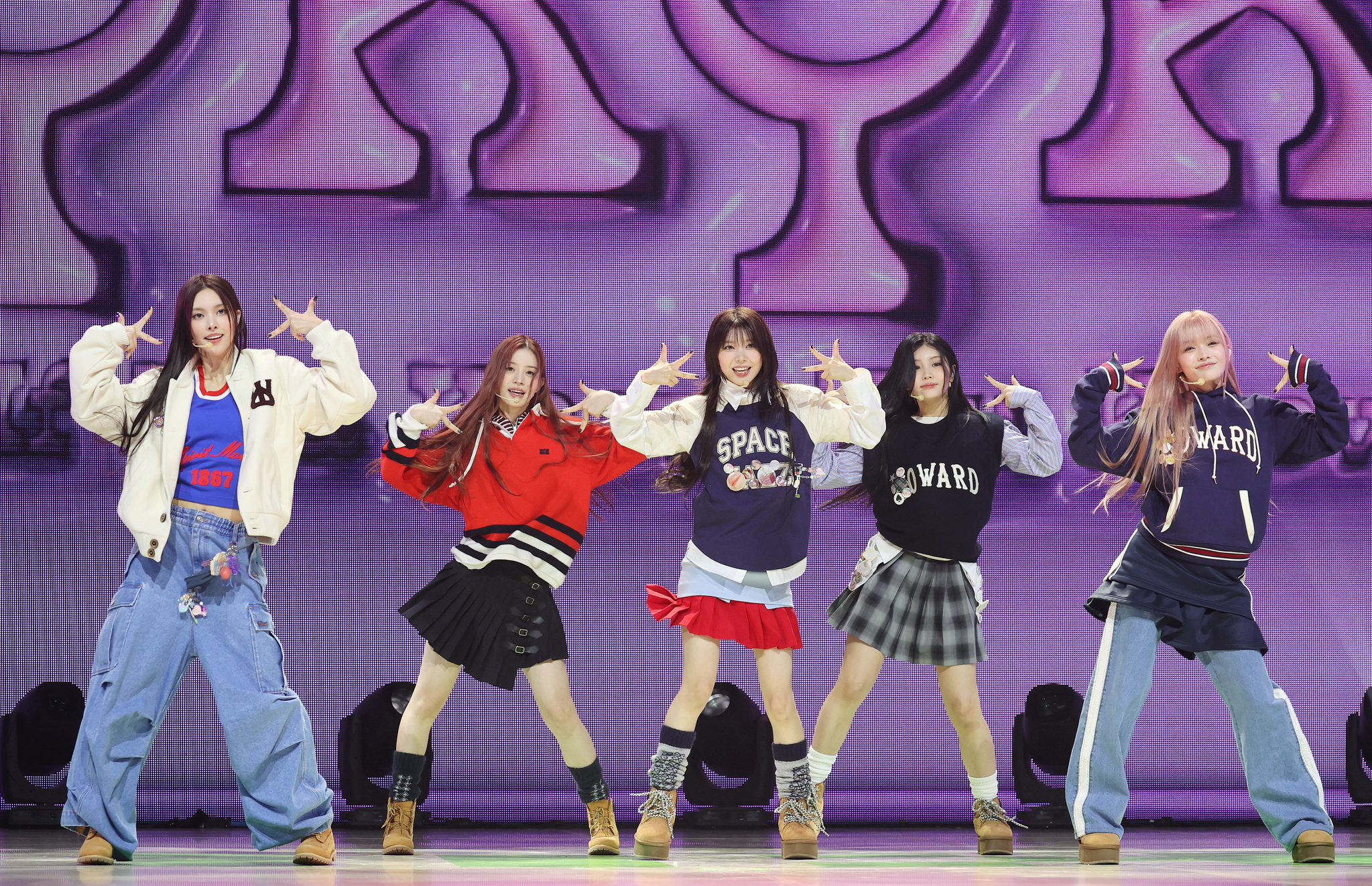 Girl group ILLIT performs B-side track ″IYKYK (If You Know You Know)″ during a press showcase Monday at the Yes24 Live Hall, eastern Seoul. [YONHAP]