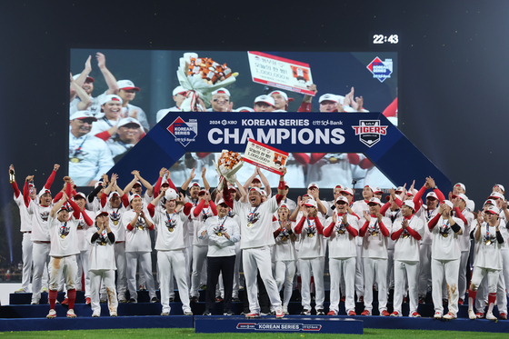 The Kia Tigers celebrate winning the 2024 Korean Series after beating the Samsung Lions 7-5 at Gwangju-Kia Champions Field in Gwangju on Monday. [YONHAP] 