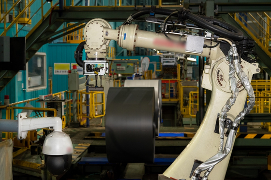A quality-managing CCTV robot overlooks cold rolled coils at the Posco Gwangyang steel plant. [POSCO]
