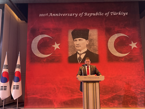 Turkish Ambassador to Seoul Murat Tamer speaks at a celebration to commemorate the 101st anniversary of the proclamation of the Republic of Turkiye, which was held in central Seoul on Tuesday evening. [LEE SOO-JUNG]