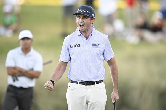 J.T. Poston celebrates after winning the final round of the Shriners Children's Open 2024 at TPC Summerlin on Oct. 20 in Las Vegas, Nevada. [GETTY IMAGES]