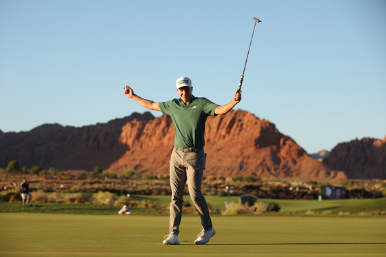 Matt McCarty celebrates on the 18th green after winning the final round of the Black Desert Championship 2024 at Black Desert Resort on Oct. 13 in St George, Utah. [GETTY IMAGES]