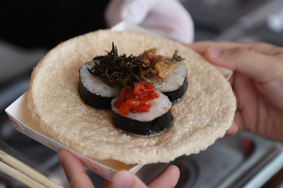 A variety of gimbap is available to try at the 2024 Jeonnam World Gimbap Festival. [YONHAP]