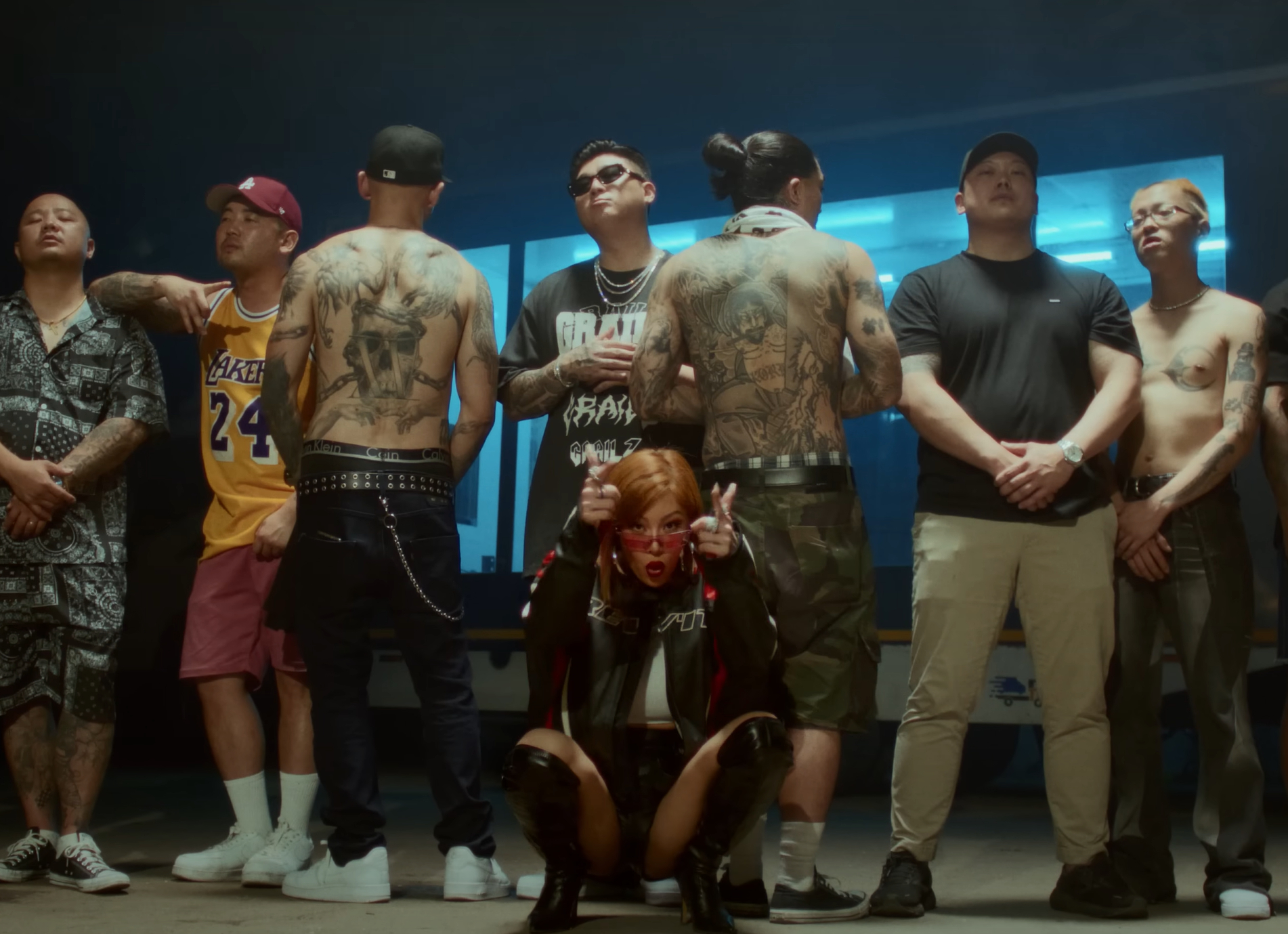 Rapper and singer Jessi and producer Koala, center, in the music video for the latter's song ″RSVP″ (2023) [SCREEN CAPTURE]