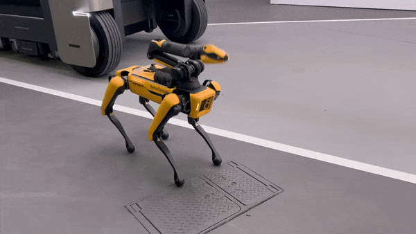 Spot, a four-legged robotic dog developed by Hyundai Motor-backed Boston Dynamics, moves at the Korean carmaker's booth at CES 2024 in Las Vegas. [SARAH CHEA]