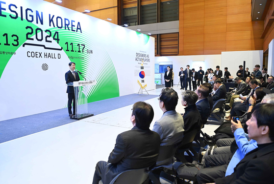 Design Korea 2024, hosted by the Ministry of Trade, Industry and Energy and organized by the Korea Institute of Design Promotion, runs from Wednesday to Sunday at Coex's Hall D in southern Seoul. Pictured is Minister of Industry, Trade and Energy Ahn Duk-geun delivering a speech at the expo's opening ceremony on Wednesday. [MINISTRY OF TRADE, INDUSTRY AND ENERGY]
