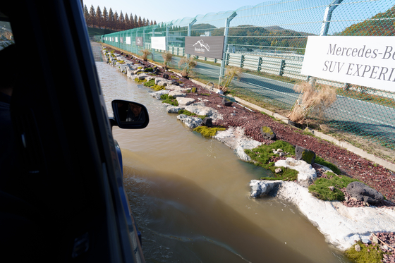 An electrified Mercedes-Benz G-Class SUV goes through off-road courses at the AMG Experience Center in Yongin, Gyeonggi.[CHO YONG-JUN]