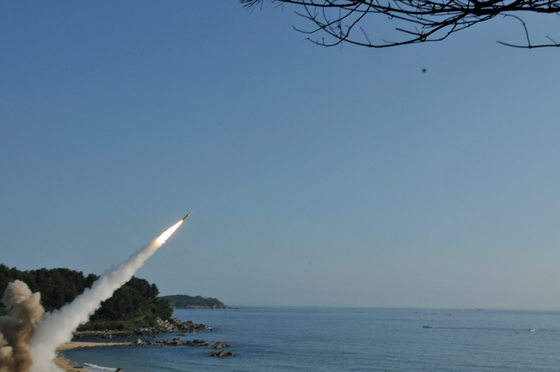 The United States and South Korean troops fire the U.S. Army Tactical Missile System (ATACMS) and Seoul's Hyunmoo Missile II into the East Sea in 2017 in a file photo provided by the 8th United States Army. [REUTERS/YONHAP]
