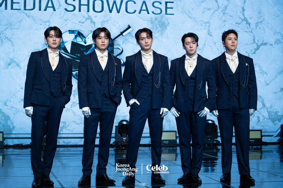 Boy band A.C.E poses for photos during a showcase held on Nov. 20 at the Ilchi Art Hall in southern Seoul for the release of its single "Pinata." [DANIELA GONZALEZ PEREZ]