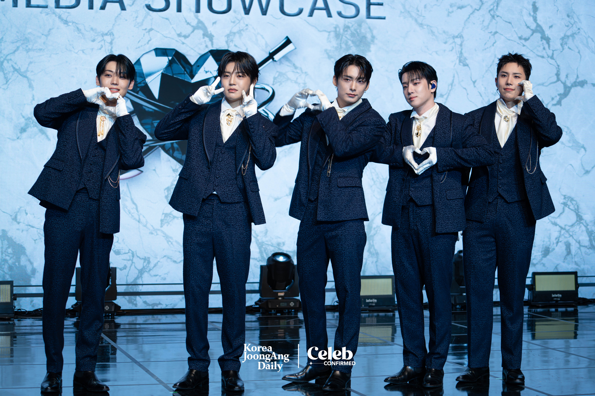 Boy band A.C.E poses for photos during a showcase held on Nov. 20 at the Ilchi Art Hall in southern Seoul for the release of its single "Pinata." [DANIELA GONZALEZ PEREZ]