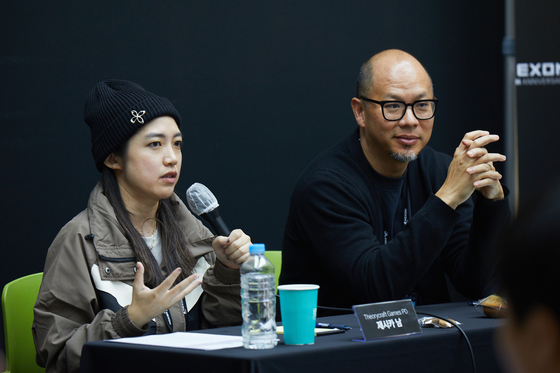 Theorycraft Games Producer Jessica Nam, left, and Theorycraft Games CEO Joe Tung during an interview held Nov. 15 at the G-Star gaming festival in Busan. [NEXON]