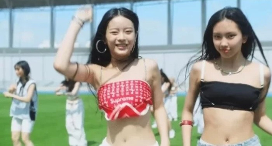 Some of NewJeans's costumes have been criticized for being too revealing for minors. [SCREEN CAPTURE]