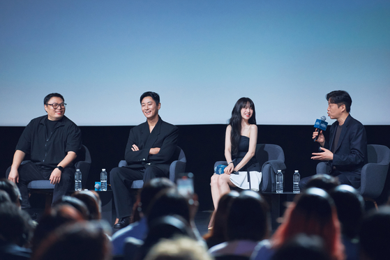 From left, screenwriter and webtoonist Kang Full, actors Ju Ji-hoon, Park Bo-young and director Kim Hee-won attend a press conference for Disney+'s upcoming series ″Light Shop″ held at Marina Bay Sands in Singapore on Wednesday. [WALT DISNEY COMPANY KOREA]