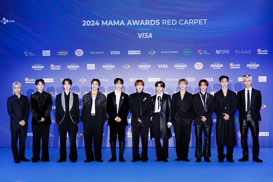 Boy band INI poses for photos at the 2024 MAMA Awards red carpet on Nov. 23 at the Kyocera Dome in Osaka, Japan. [CJ ENM]