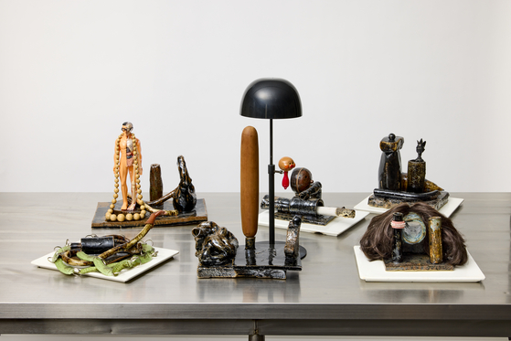 "A Rough Day at the Workshop - Picolas Cage called Cornichon" (2022-24), far left, and the rest are collectively "A Rough Day at the Workshop 1~5" (2022-24) by Nayoungim & Gregory Maass [ATELIER HERMES]