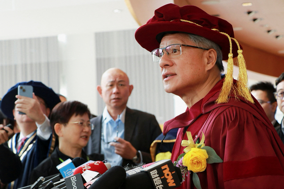 Nvidia CEO Jensen Huang speaks to the media after receiving an honorary degree from Hong Kong University of Science and Technology in Hong Kong on Nov. 23. [REUTERS/YONHAP]