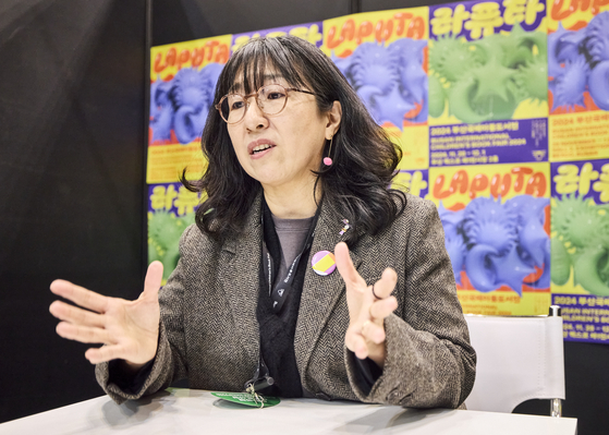 Author Lee Suzy talks to the press during the Busan International Children's Books Fair at Bexco, Busan, on Thursday. [KOREA PUBLISHERS ASSOCIATION] 