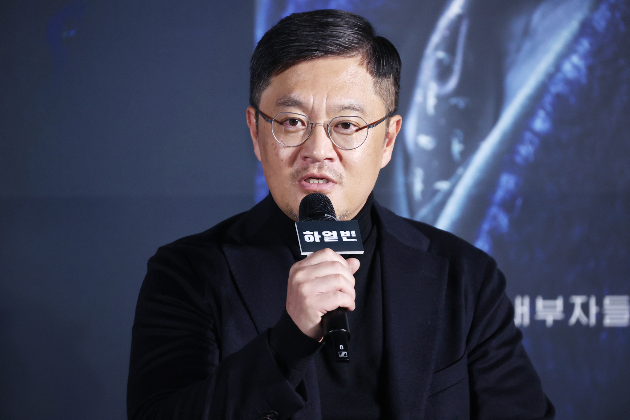 Director Woo Min-ho speaks during a press conference for upcoming historical film ″Harbin″ held in Yongsan District, central Seoul, on Wednesday. [YONHAP]