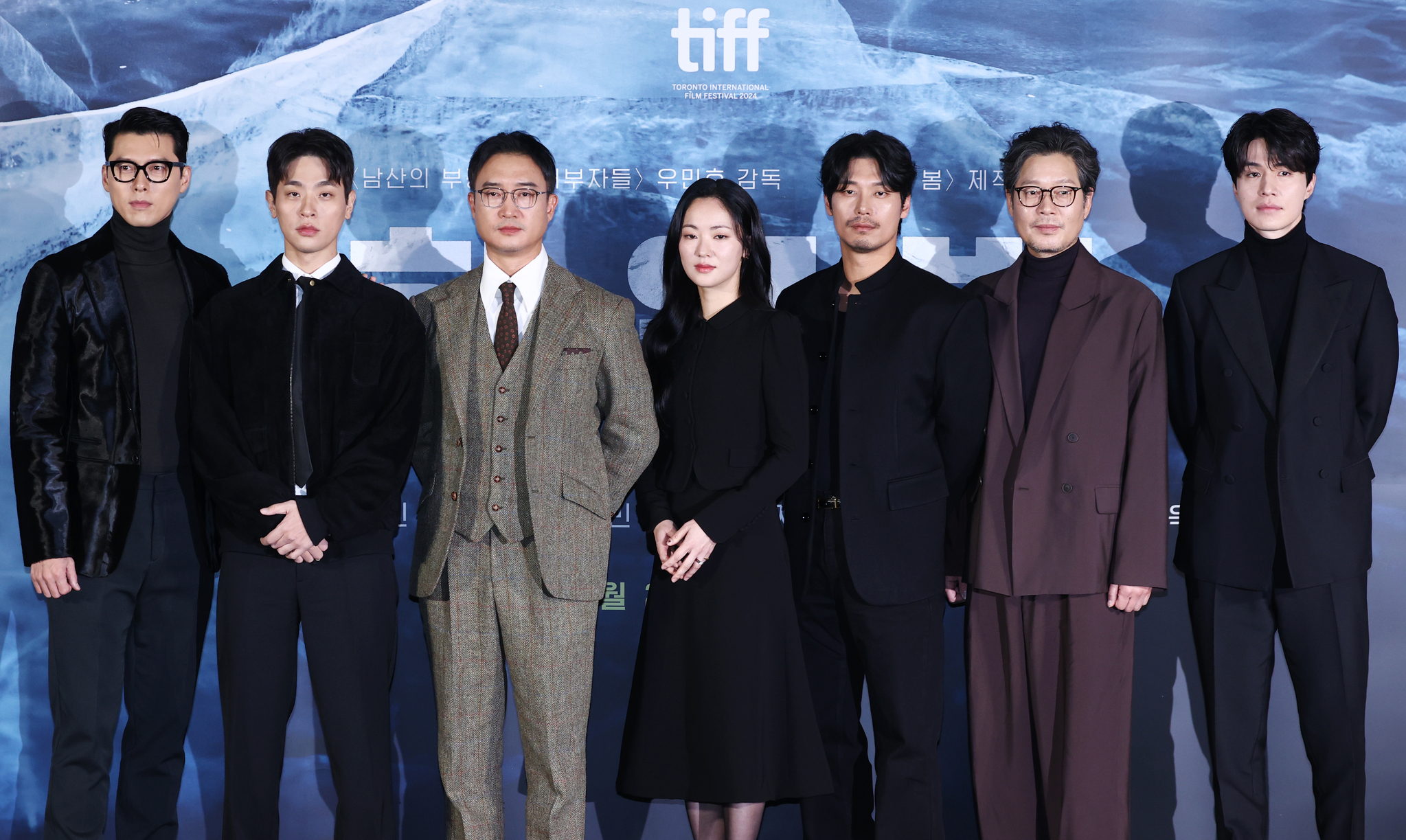The cast and director of upcoming historical film ″Harbin″ pose for photos during the film's press conference held in Yongsan District, central Seoul, on Wednesday. From left are: actors Hyun Bin, Park Jeong-min, Jo Woo-jin, Jeon Yeo-been, Park Hoon, Yoo Chea-myung and Lee Dong-wook [YONHAP]