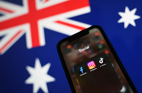 Facebook, Instagram and TikTok apps are seen on a smartphone. [REUTERS] 