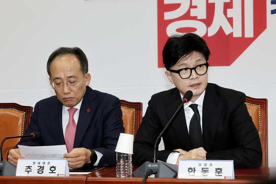 The president's People Power Party (PPP) leader Han Dong-hoon speaks during a Supreme Council meeting on Thursday at the National Assembly in western Seoul. [JEON MIN-GYU] 