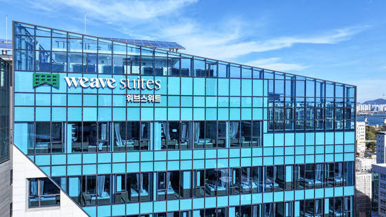 The exterior of the Weave Suites Sunyu Parkside, located near Yeouido Business District (YBD). [WEAVE LIVING]