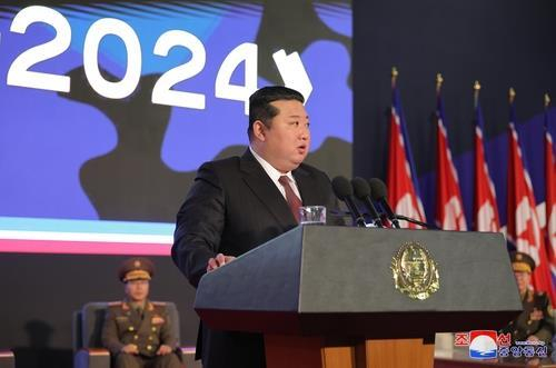 Kim Jong-un delivers a speech at the opening ceremony of an arms exhibition titled ″National Defense Development-2024,″ in Pyongyang. [KOREAN CENTRAL NEWS AGENCY] 