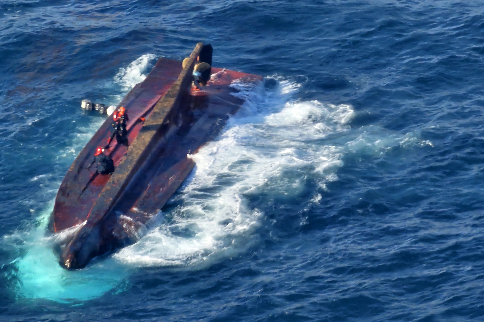 A fishing boat capsized after colliding with a cargo ship in waters near Gyeongju, about 270 kilometers (168 miles) southeast of Seoul on Monday. [POHANG COAST GUARD]