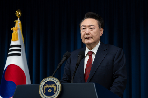 President Yoon Suk Yeol makes a public apology in a televised address from the Yongsan presidential office in Seoul on Saturday. [PRESIDENTIAL OFFICE]
