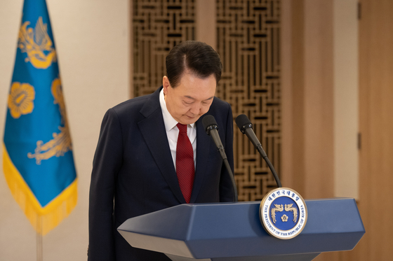 President Yoon Suk Yeol bows before giving an address at the presidential office in Yongsan, central Seoul, on Thursday. [PRESIDENTIAL OFFICE] 